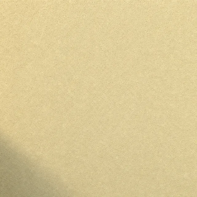 Ivory (NCS S 3010-Y30R) silicate facade paint on fine mineral render