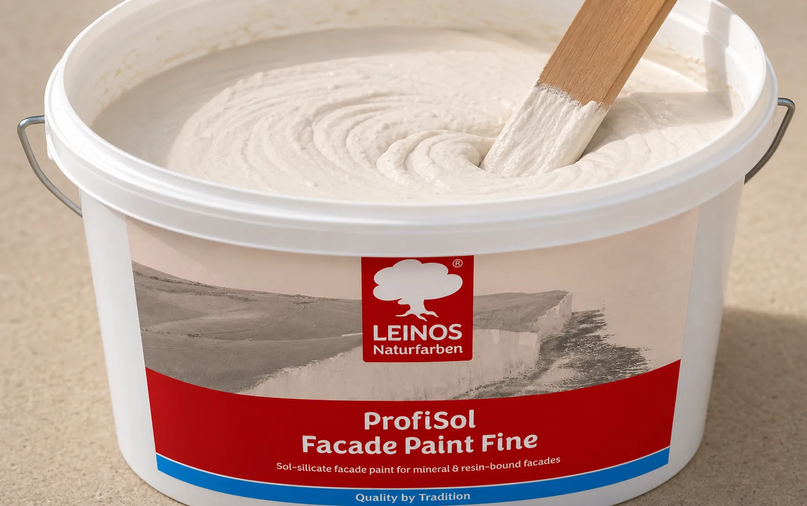 Open branded white LEINOS ProfiSol Facade Paint Fine bucket with a paddle stirring pale mineral facade paint