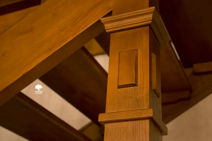 Handrail close-up with hand-rubbed satin finish — high-touch surface protected by Hardwax Oil 290.