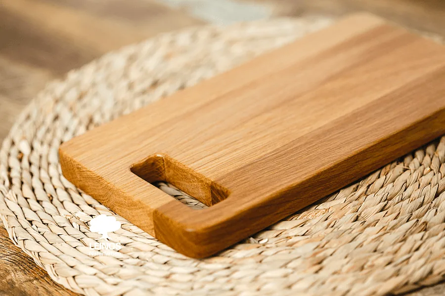 End-grain detail at the cut-out handle — oil saturation even with the face grain.