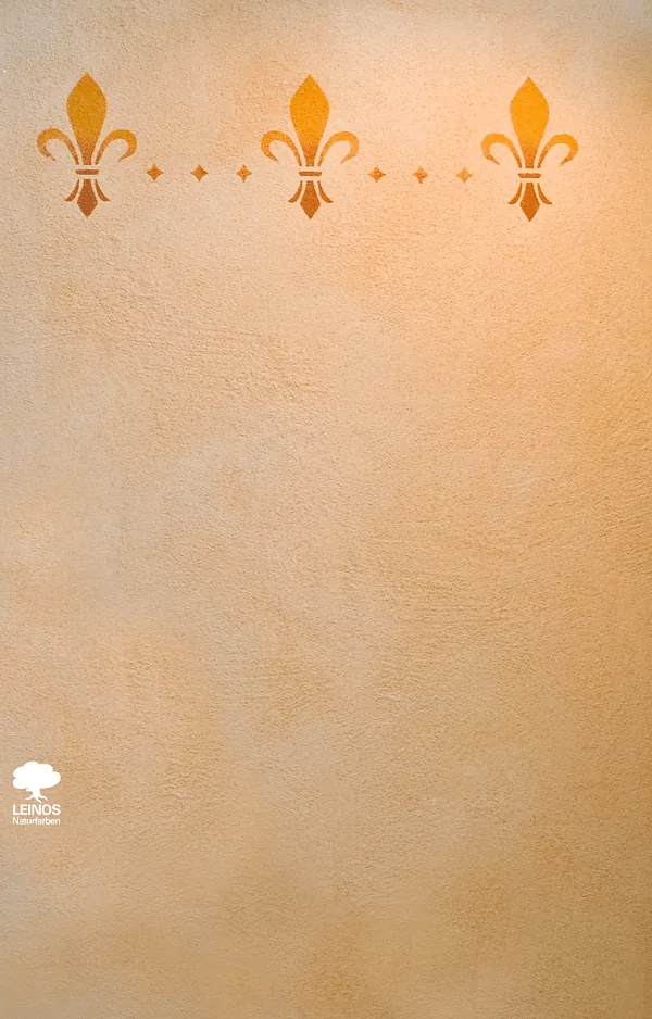 Close-up of the wall surface under afternoon sun — trowel-stroke ridges and tonal variation catching the light.