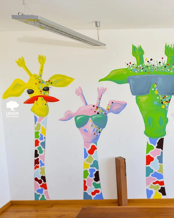 Colourful Giraffe Mural on Lime-Painted Wall