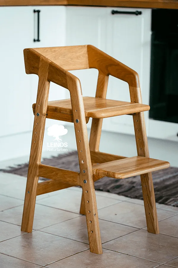 Underside of the seat — joinery surfaces oiled before reassembly, no bleed risk under humidity.