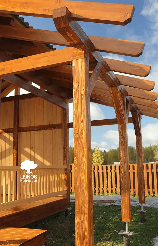 Wide deck boards beneath the pavilion — horizontal foot-traffic surface sealed with LEINOS Terrace Wood Oil 236.