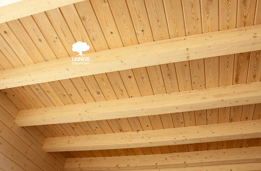 Ceiling-to-wall junction — continuous tonal register across the orientation change.