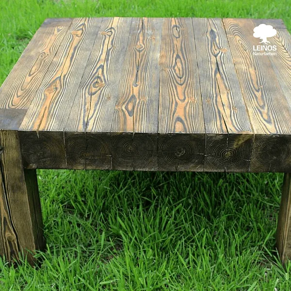 Top-down view of both tables together — uniform dark tone across two separately built pieces.