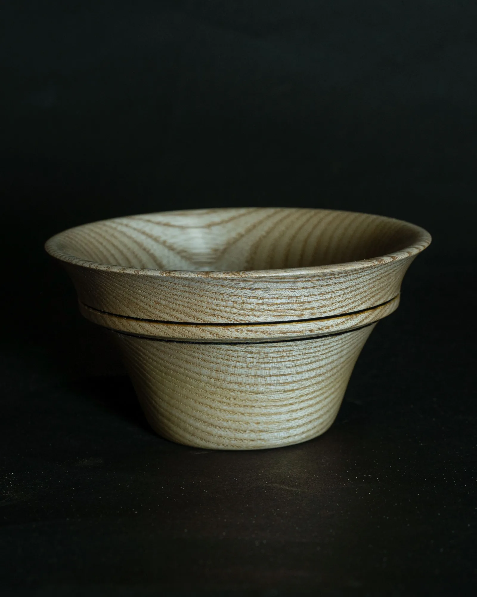 A turned white-ash bowl by Kathkani Studio with wire-burned bead rings around a gently flared profile, finished in LEINOS Interior Hardwax Oil 290.